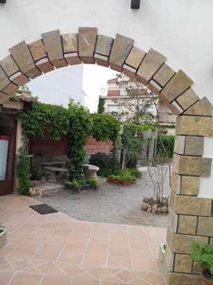 Κήπος έξω από το Apartamentos Turisticos Sanahuja