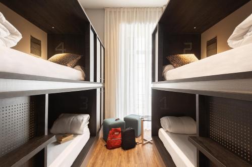 Postel nebo postele na pokoji v ubytování TOC Hostel Malaga