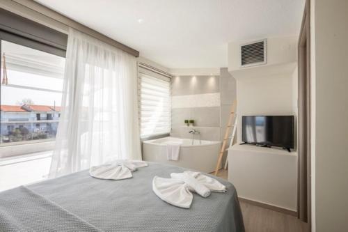 Ένα ή περισσότερα κρεβάτια σε δωμάτιο στο Hanioti suite mezonete 6 people