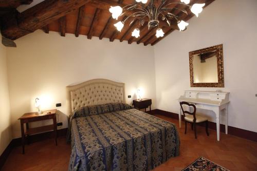 Llit o llits en una habitació de Residence Villa La Fornacina
