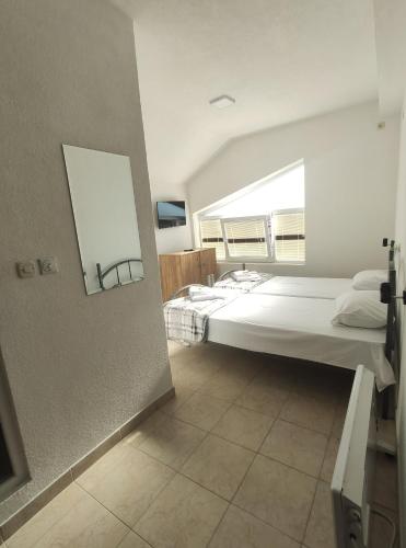 Hostel and Apartments Prilepにあるベッド