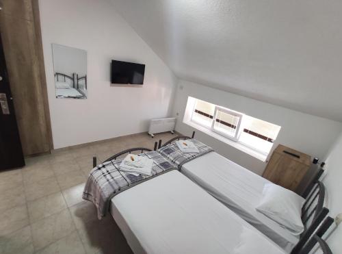 Hostel and Apartments Prilepにあるベッド