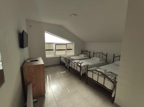 Hostel and Apartments Prilepにあるベッド