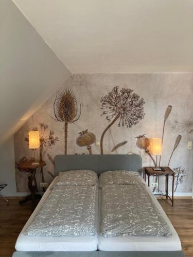 Postelja oz. postelje v sobi nastanitve Hotel Gästehaus Hochmann Stadecken