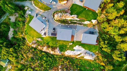 an aerial view of a yard with a house at Funky cabin with a panoramic view of the Oslofjord in Nordre Frogn
