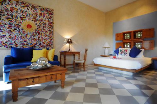 Postel nebo postele na pokoji v ubytování Casa Natalia Boutique Hotel Adults Only