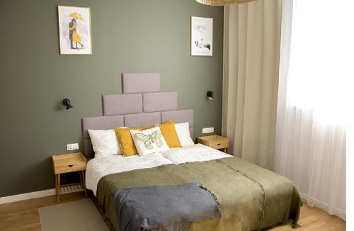 Posteľ alebo postele v izbe v ubytovaní Apartament na Jeziornej