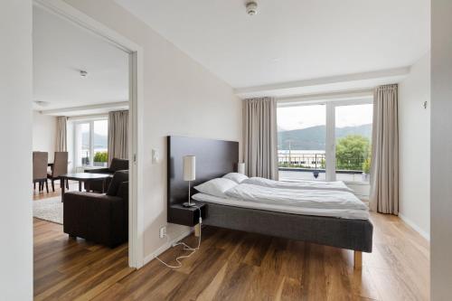 Ένα ή περισσότερα κρεβάτια σε δωμάτιο στο Aursnes Hotell
