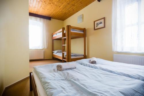Postel nebo postele na pokoji v ubytování Chata Jiriho na Seraku