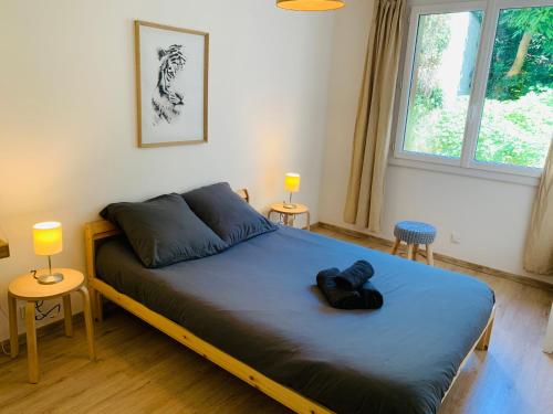Кровать или кровати в номере Mont D'Or Appartement