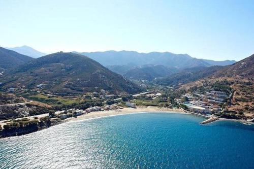 an aerial view of a beach with mountains at bougainvilla in Fodele