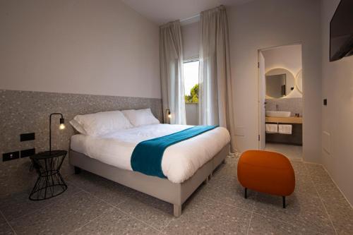 Postel nebo postele na pokoji v ubytování Elide Design Hotel