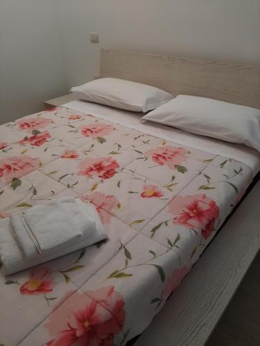 Giường trong phòng chung tại Casa vacanze da Cinzia