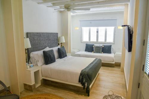 Llit o llits en una habitació de CASA AZZURRA WALLED CITY - Cartagena