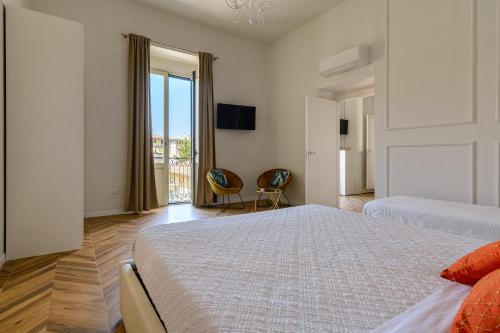A bed or beds in a room at agropoli luxury home