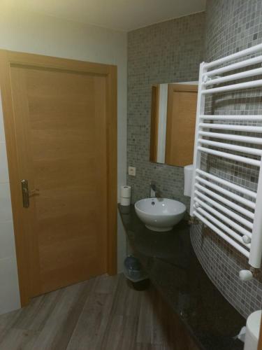 Ett badrum på Hostal y Albergue Carpinteiras