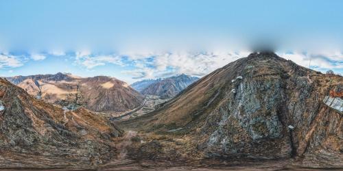 a mountain in the middle of a mountain range at Vertical Sky Suites in Ollantaytambo
