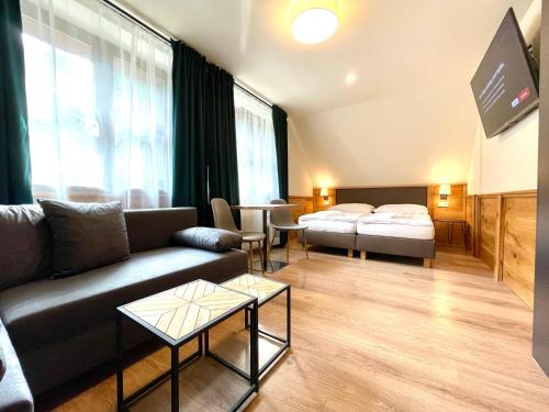 Postel nebo postele na pokoji v ubytování Villa Pinus Slovenský raj - Hotel Čingov dependance