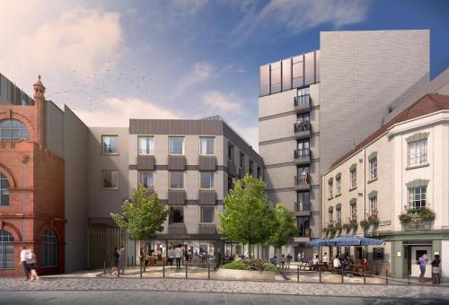 a rendering of a building with people walking in the street at Clayton Hotel Bristol City in Bristol