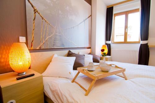 Postel nebo postele na pokoji v ubytování Zagreb Deluxe Apartment L2