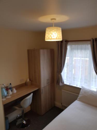 Postel nebo postele na pokoji v ubytování Bella Room with free minibar tea&coffee
