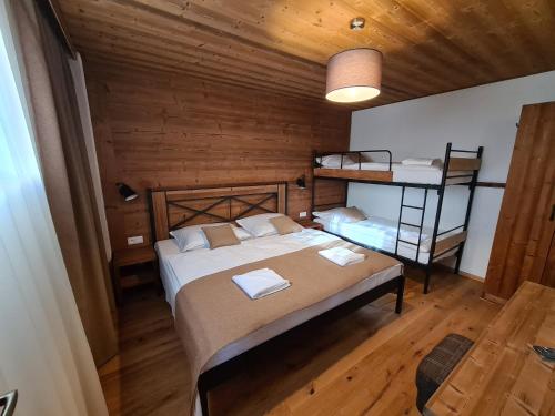 Postel nebo postele na pokoji v ubytování Chalet Alaskit Jasná