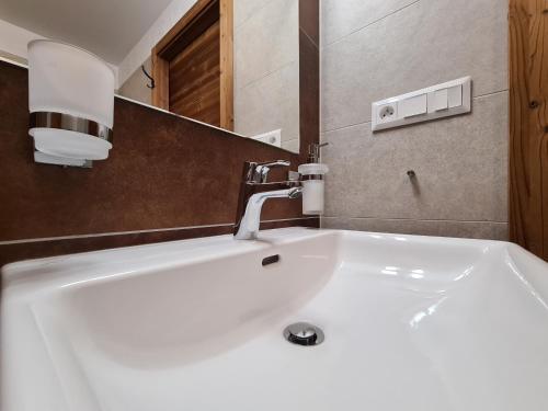 Koupelna v ubytování Chalet Alaskit Jasná