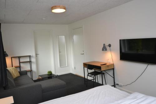 Postel nebo postele na pokoji v ubytování Dalby Hotel