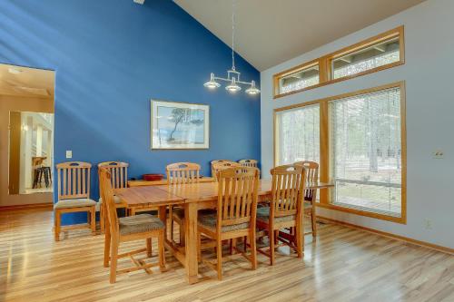 a dining room with a wooden table and chairs at 1 Colonial in Sunriver