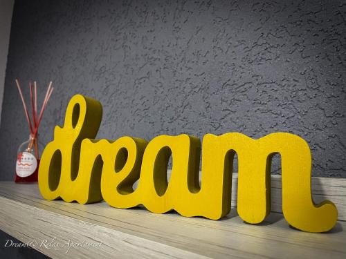 a yellow sign that says amazon on a shelf at Dream&Relax Apartament Cazare Lupeni-Straja in Lupeni