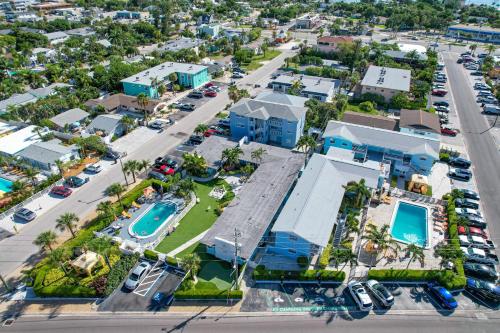 an aerial view of a resort with a parking lot at St. Pete Beach Suites in St Pete Beach