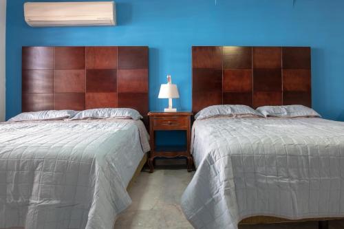 Ein Bett oder Betten in einem Zimmer der Unterkunft Loft Sabalo - Pet Friendly