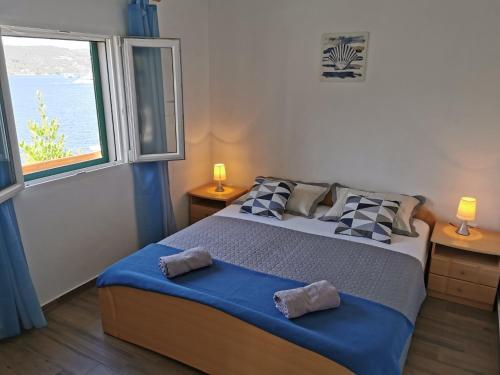 מיטה או מיטות בחדר ב-Holiday home Vers - 35m from the sea