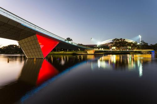 a bridge over a body of water at Oval Hotel at Adelaide Oval in Adelaide