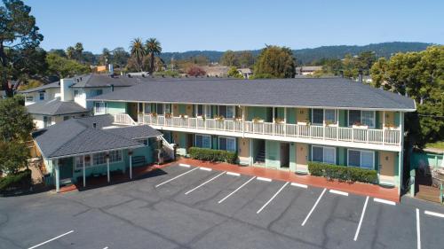 an aerial view of a hotel with a parking lot at Villa Franca Inn in Monterey