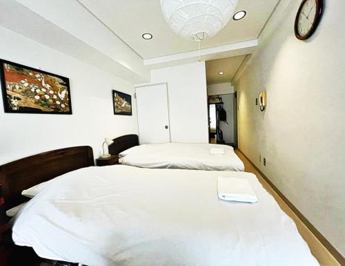 En eller flere senge i et værelse på ☆Cozy Japanese style room☆