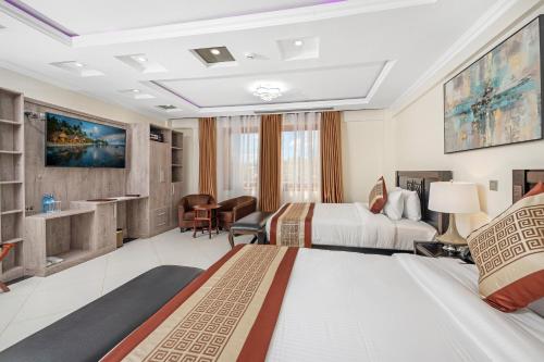 Postel nebo postele na pokoji v ubytování Esiankiki Resort & Spa - Nanyuki