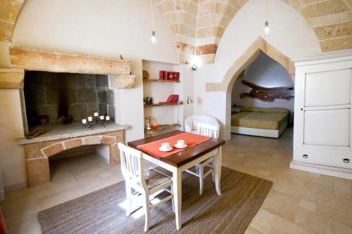Katil atau katil-katil dalam bilik di Masseria Stellato