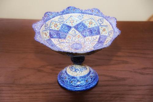a blue and white vase sitting on a table at Petra Stones Inn in Wadi Musa