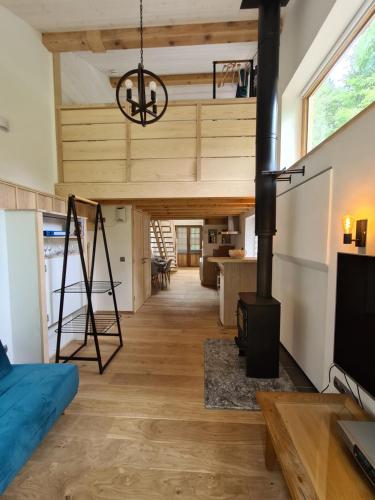 a loft conversion of a house with a wood stove at Chalet Cristal Trail in Chamonix