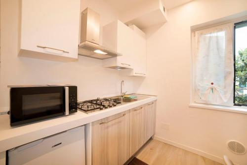Cuisine ou kitchenette dans l'établissement Dimore Verona