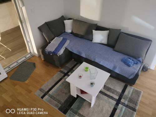 Posezení v ubytování CITY CENTER PEARL #new#free reserved parking in garage elevator direct access#business and pleasure#city view&balcony&sunny&cafes&markets&tram#city center#working room#2 toliets#2 bedrooms