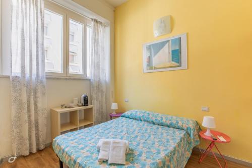 Ένα ή περισσότερα κρεβάτια σε δωμάτιο στο Casa Arsella