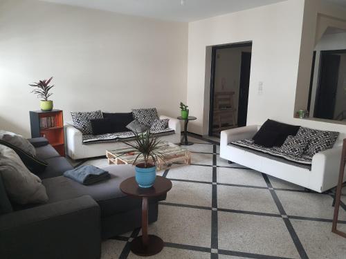 Χώρος καθιστικού στο Chambre mignonne avec petite terrasse