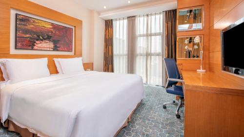 Μια τηλεόραση ή/και κέντρο ψυχαγωγίας στο Holiday Inn Express Beijing Huacai by IHG