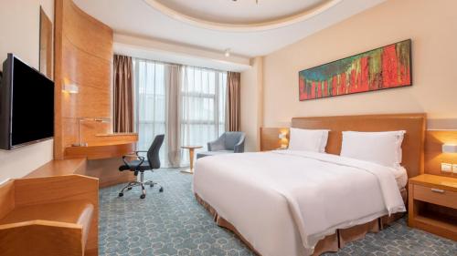 Μια τηλεόραση ή/και κέντρο ψυχαγωγίας στο Holiday Inn Express Beijing Huacai by IHG