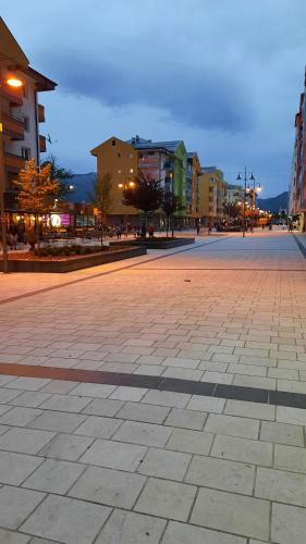 an empty street in a city with buildings at Apartmani RALE rooms in Sarajevo