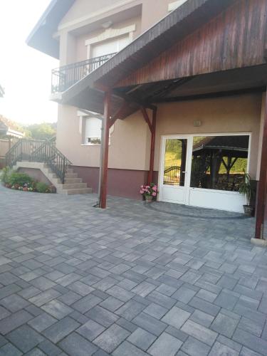 a patio in front of a building at BLAGOJEVIĆ in Guča