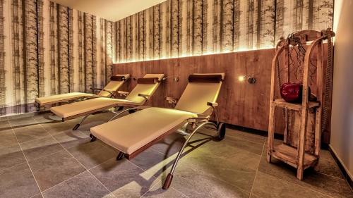 a row of chairs in a waiting room at Hotel Traumblick in Oberhof