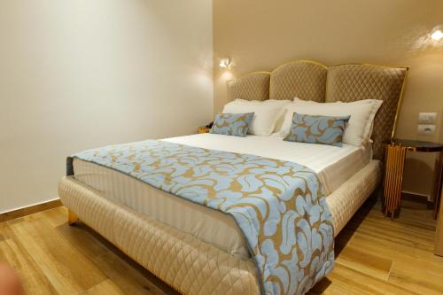 Кровать или кровати в номере Bora Bora Hotel Ksamil